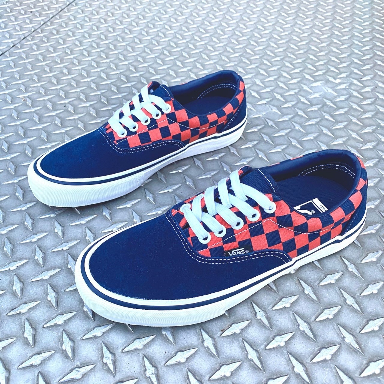 blue and orange checkered vans 