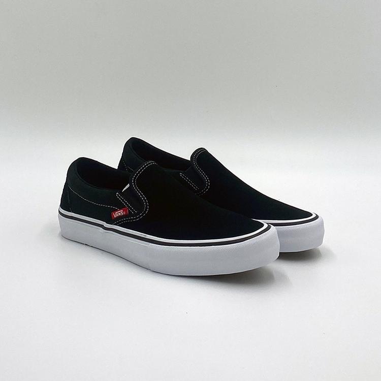 vans black mono slip on