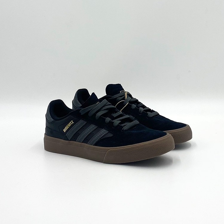 all black adidas gum sole