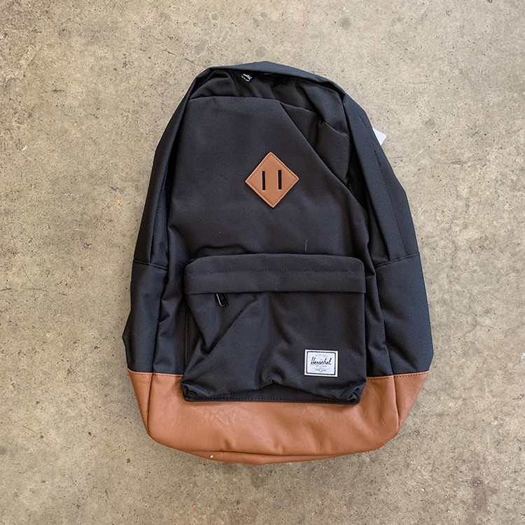 black and tan backpack