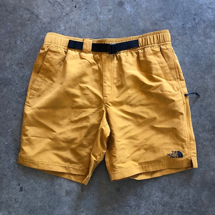 north face yellow shorts