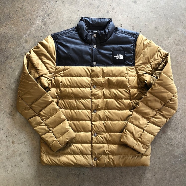 khaki and black north face jacket