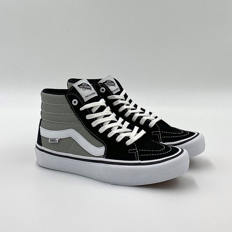 black and silver vans