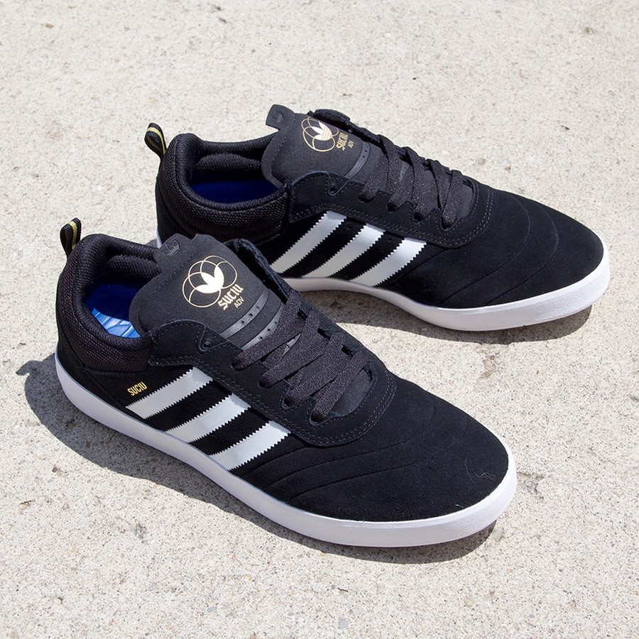 Adidas SUCIU ADV (CBLACK/FTWWHT/GOLDMT) Shoes at Embassy