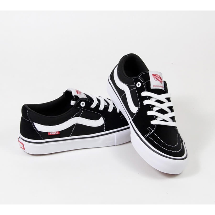 black and white vans with jeans