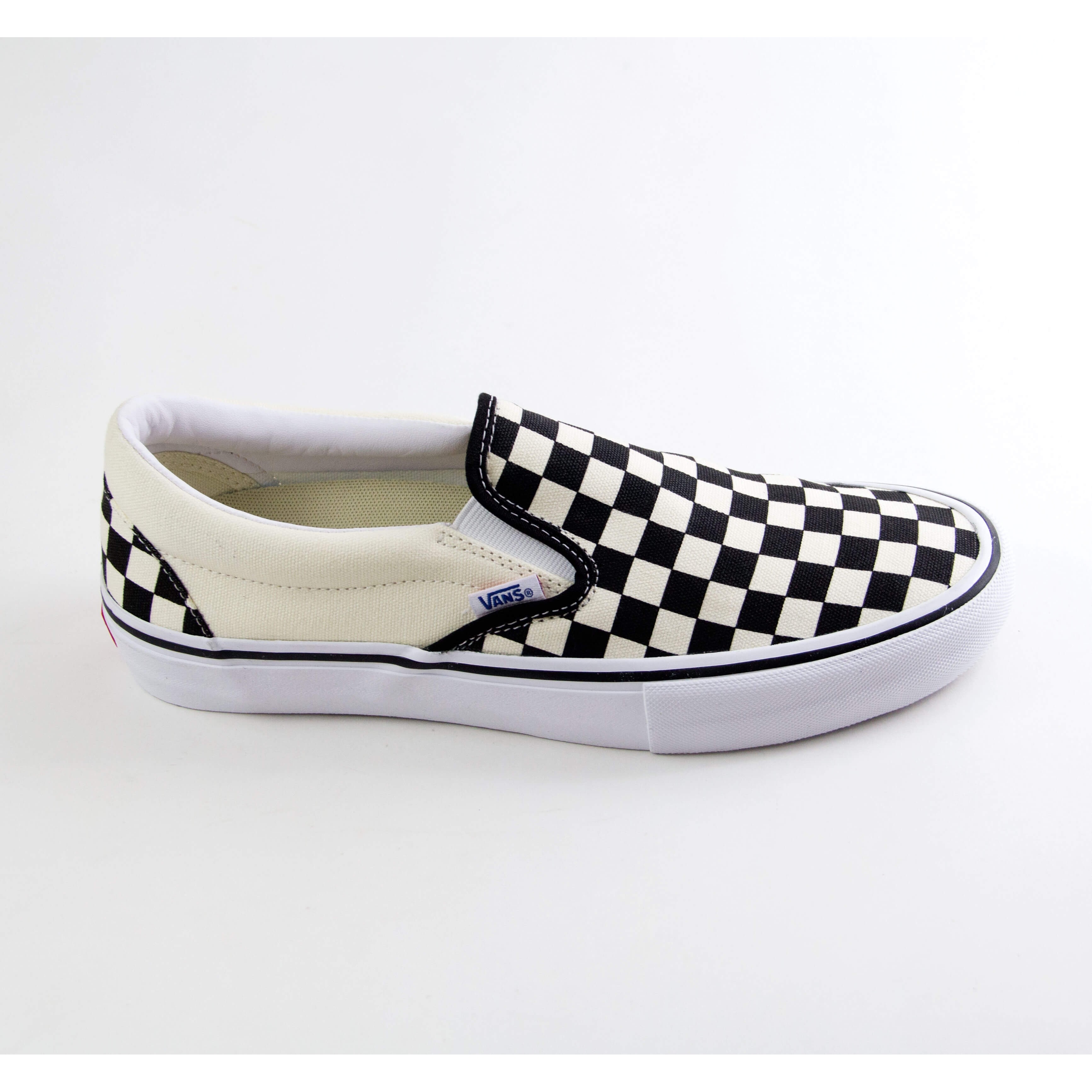 vans checkerboard slip on tan