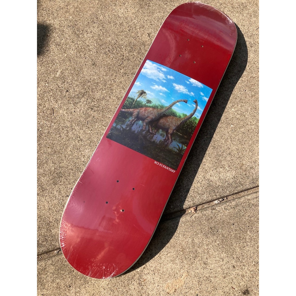 Sci-Fi Fantasy Dino Board Decks at Home Skateshop