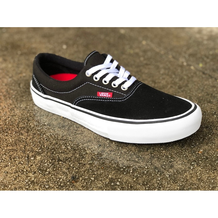 all black vans era pro