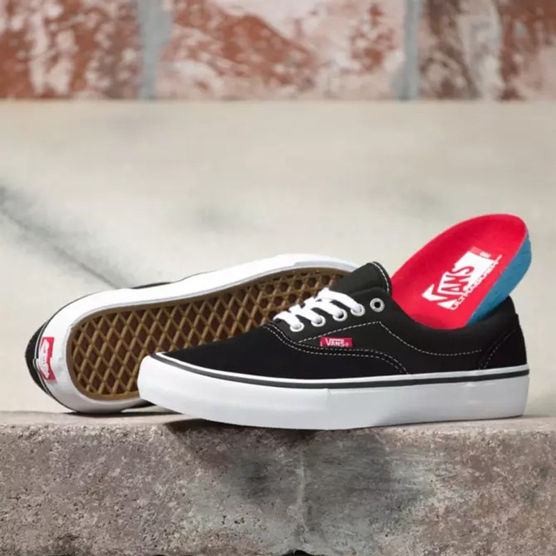 black vans era pro