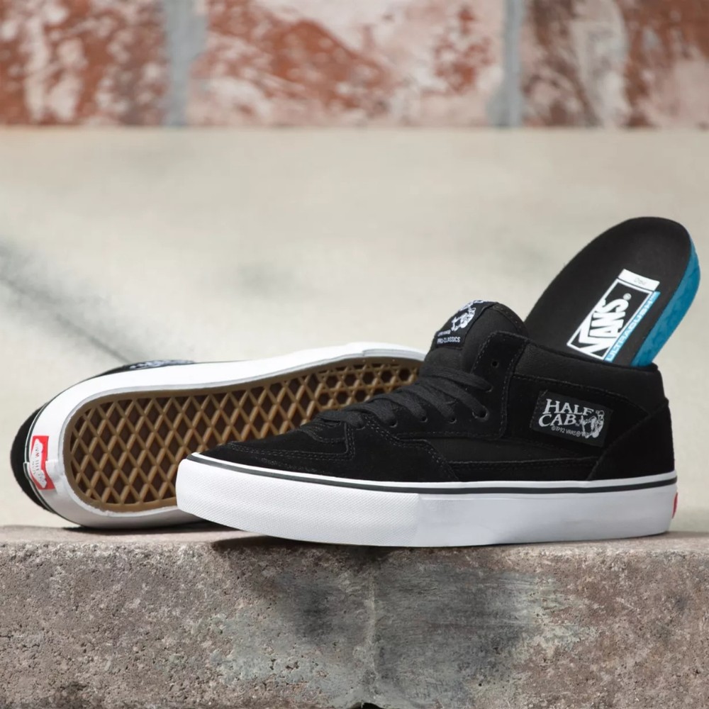 half black half white vans