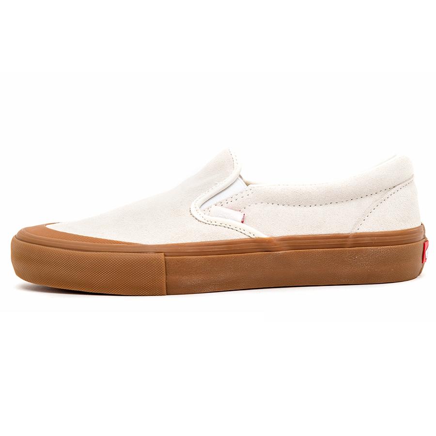 white slip on vans with gum sole