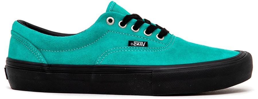 turquoise and black vans
